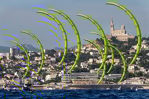 Switzerland's Elena Lengwiler leads the pack during women's kite race